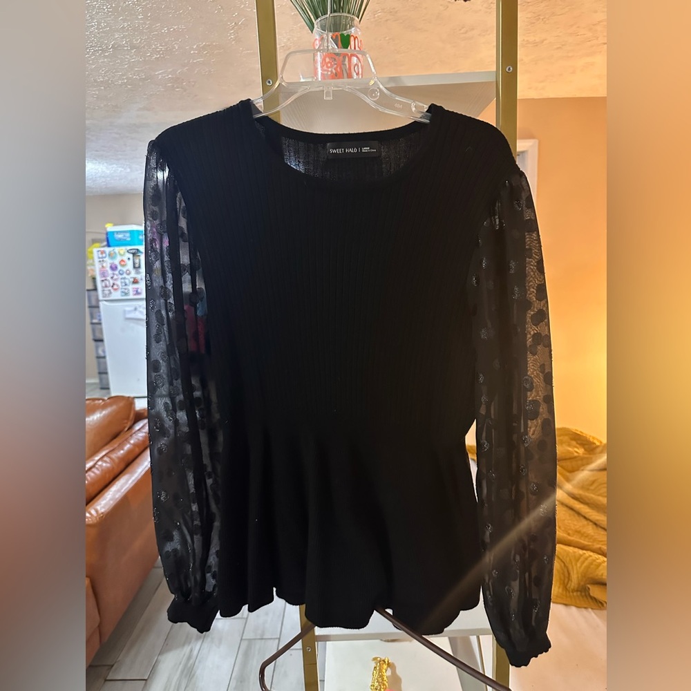 Black peplum sweater